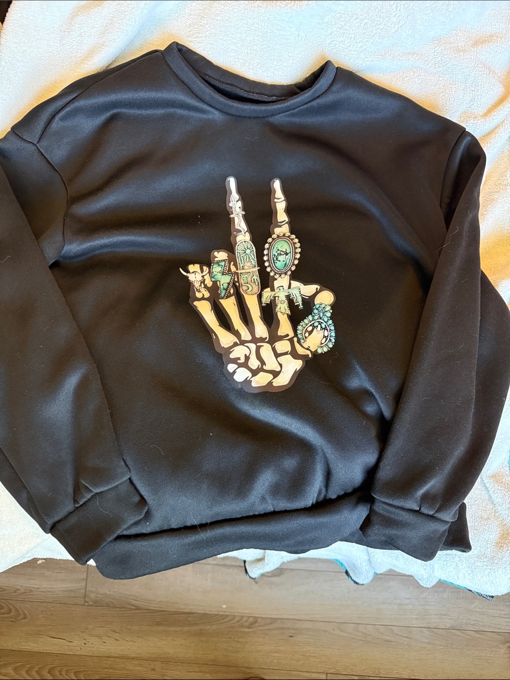 SHEIN Black Crewneck Sweatshirt with Skeleton Hand Graphic and Turquoise Accents